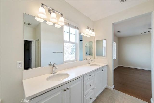 bathroom featuring vanity and hardwood / wood-style flooring