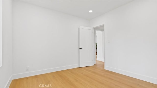 empty room featuring hardwood / wood-style floors