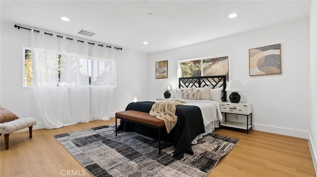 bedroom with hardwood / wood-style floors