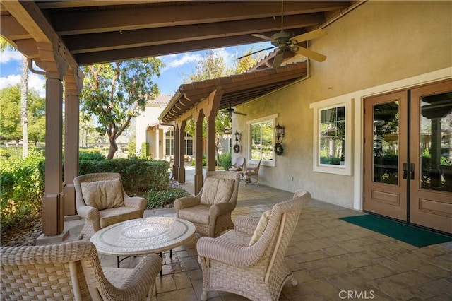 view of patio with ceiling fan