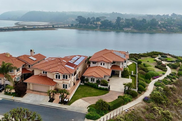 bird's eye view with a water view