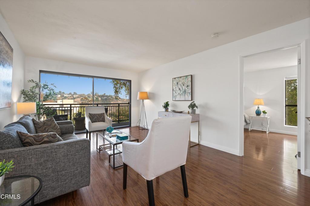 living room with dark hardwood / wood-style floors