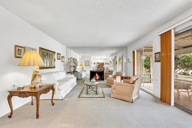 living room with carpet and a textured ceiling