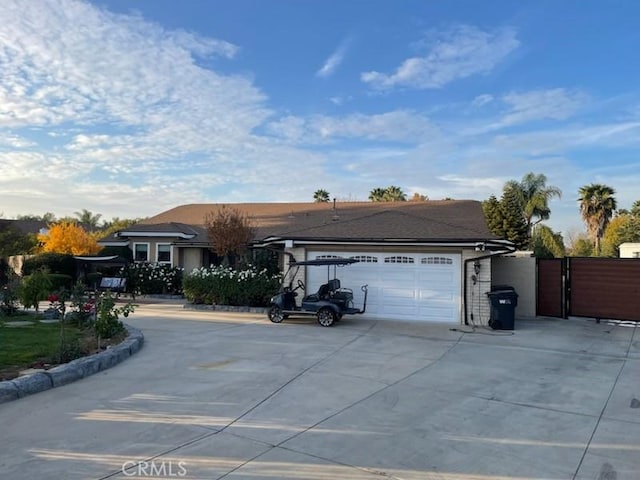 ranch-style house featuring a garage