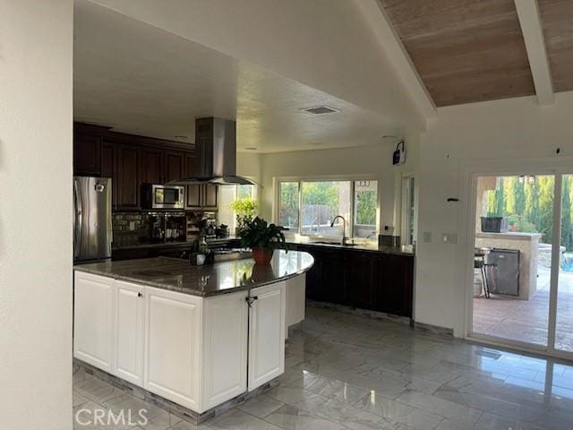 kitchen featuring white cabinetry, island exhaust hood, stainless steel appliances, sink, and wooden ceiling