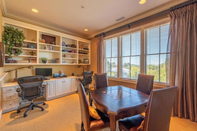 carpeted office featuring crown molding