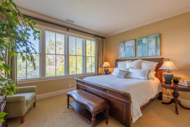 carpeted bedroom with crown molding and multiple windows