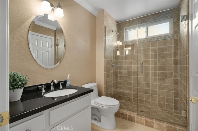 bathroom featuring crown molding, toilet, vanity, and walk in shower