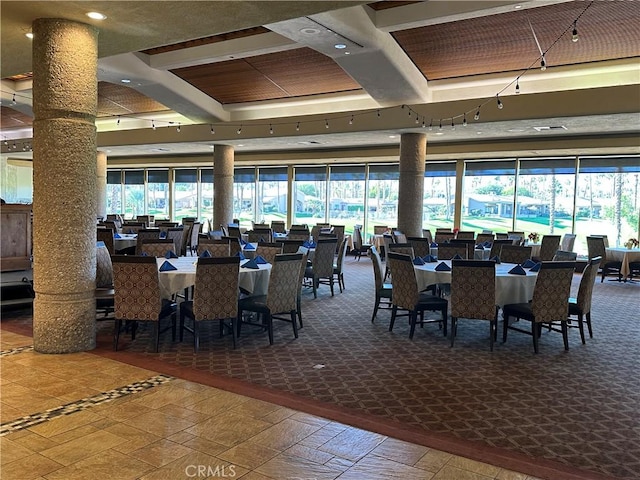 dining room with beamed ceiling