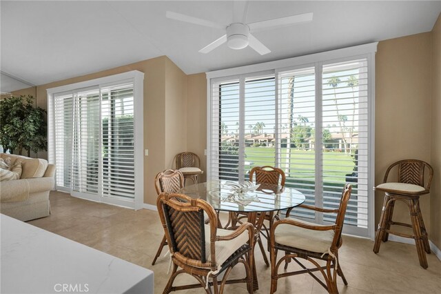 dining room featuring ceiling fan