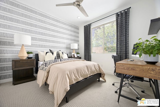 bedroom with light colored carpet and ceiling fan