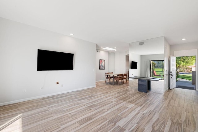 game room featuring light hardwood / wood-style floors