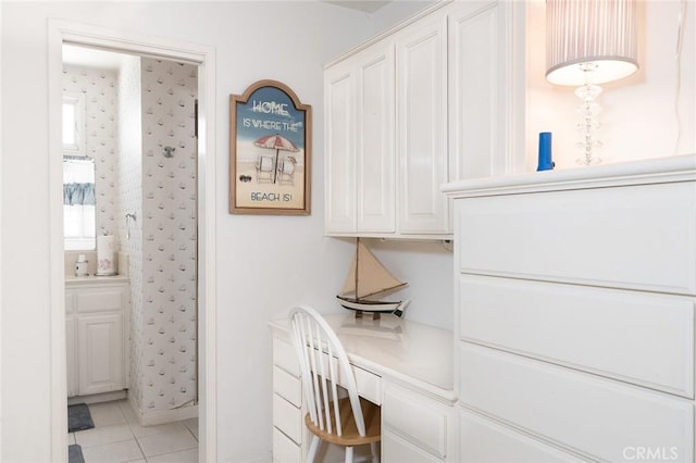 home office with light tile patterned floors