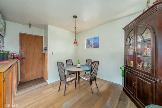 dining room featuring light hardwood / wood-style flooring