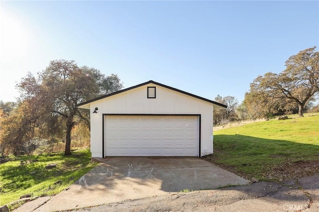 garage with a lawn