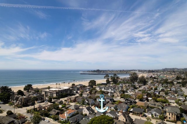 aerial view featuring a water view and a beach view