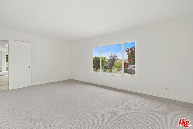 empty room with carpet floors