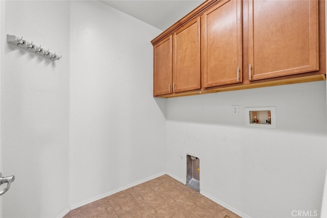 laundry room with cabinets and hookup for a washing machine