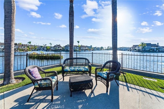 view of patio featuring a water view