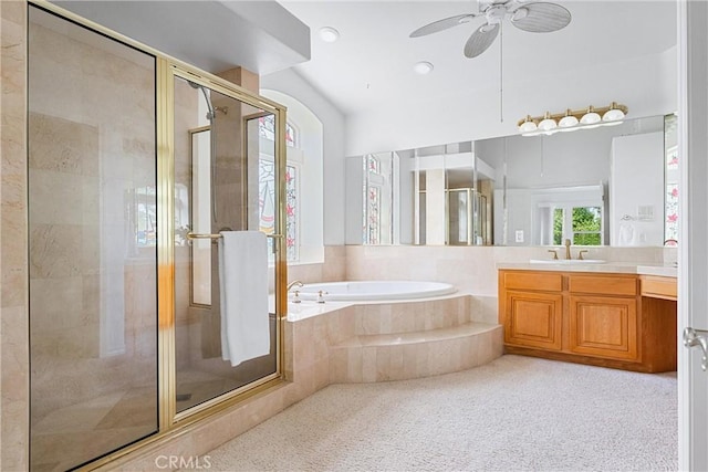 bathroom featuring separate shower and tub, ceiling fan, and vanity