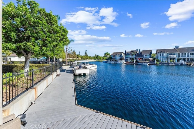 dock area featuring a water view