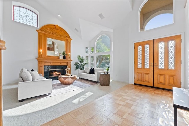 entryway with high vaulted ceiling