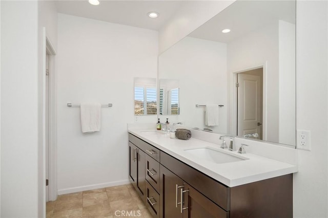 bathroom featuring tile patterned floors and vanity