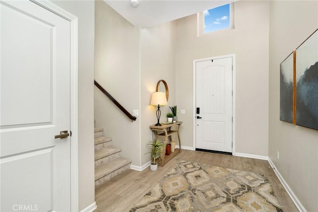 foyer with light wood-type flooring