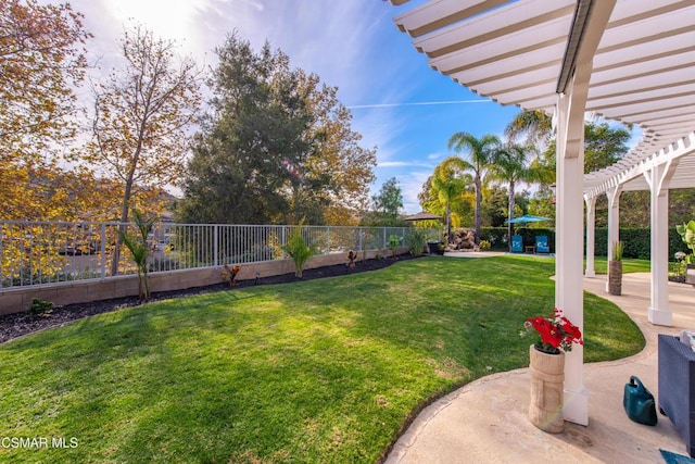 view of yard with a patio area and a pergola