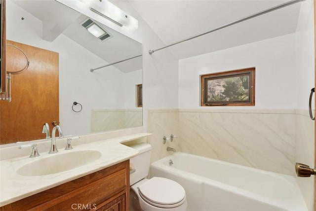 full bathroom featuring vanity, bathtub / shower combination, lofted ceiling, and toilet