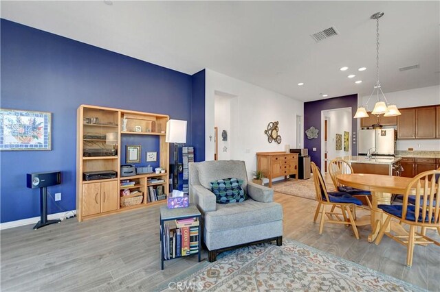 living room featuring light hardwood / wood-style floors