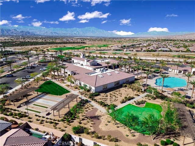 birds eye view of property featuring a mountain view