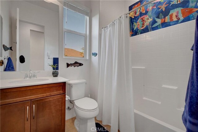 full bathroom with toilet, tile patterned flooring, shower / bathtub combination with curtain, and vanity