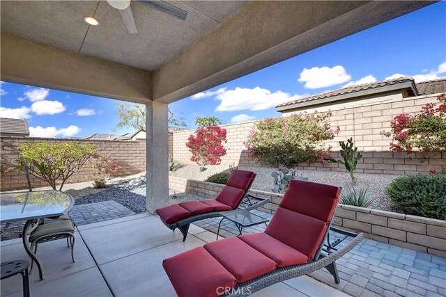 view of patio with ceiling fan