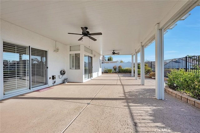 view of patio featuring ceiling fan