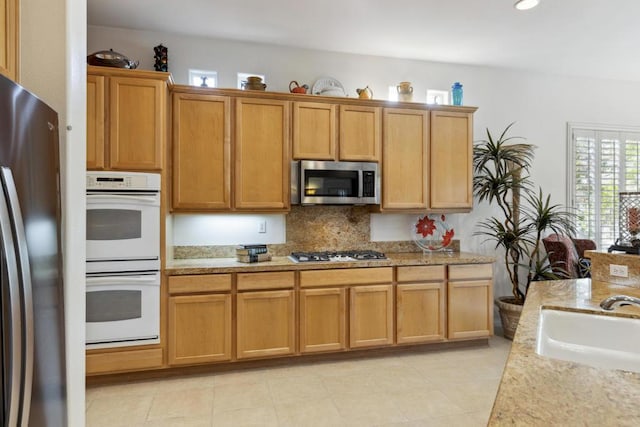 kitchen with stainless steel appliances and sink