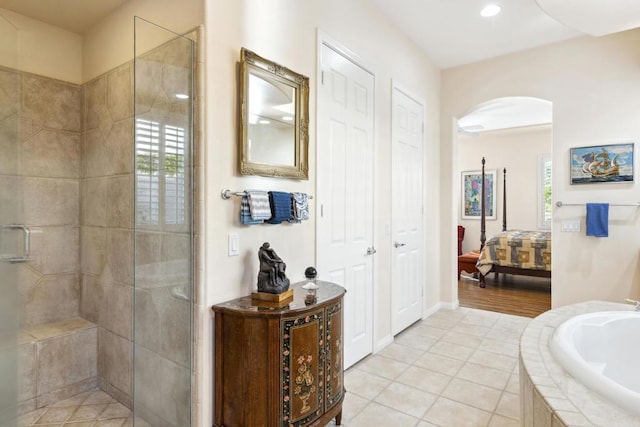 bathroom featuring separate shower and tub, sink, plenty of natural light, and hardwood / wood-style flooring