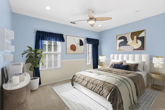 carpeted bedroom with ceiling fan