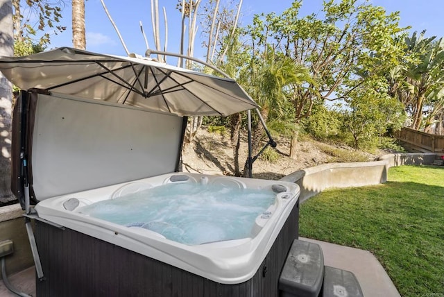 view of patio with a hot tub