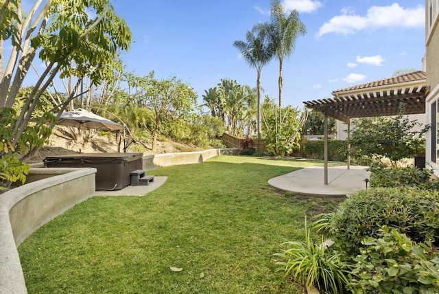 view of yard with a patio area, a pergola, and a hot tub