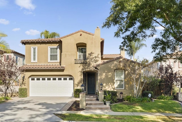 mediterranean / spanish-style house featuring a garage