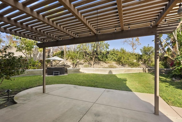 view of patio / terrace with a pergola and a hot tub