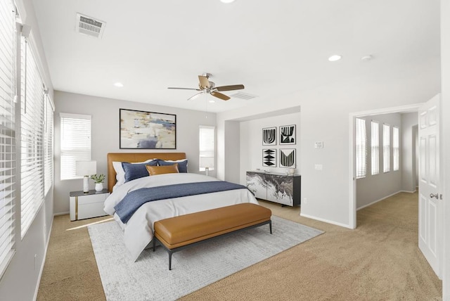 carpeted bedroom featuring ceiling fan