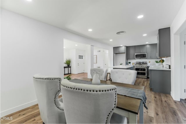 dining room featuring hardwood / wood-style floors