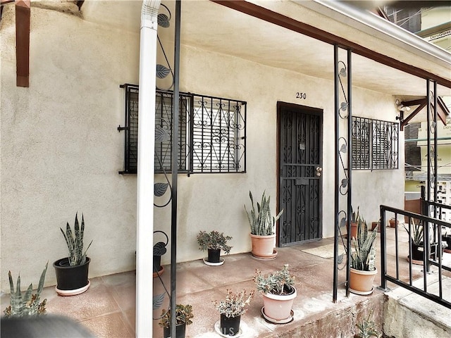 entrance to property with covered porch