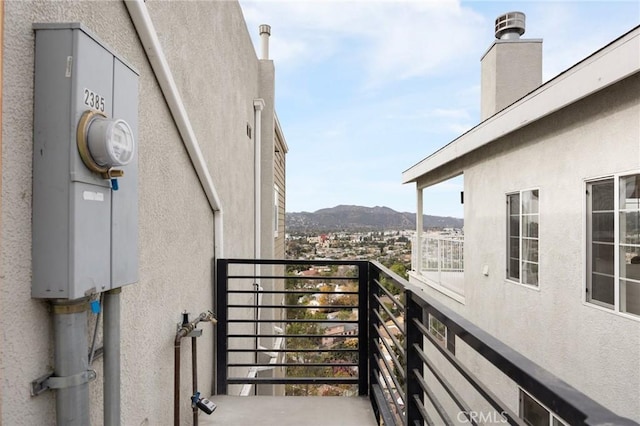 balcony featuring a mountain view