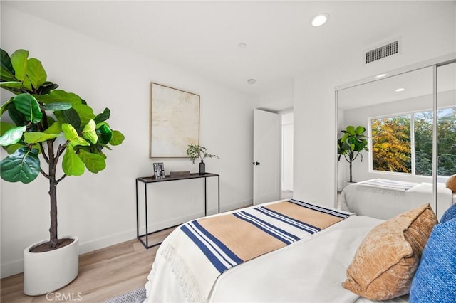 bedroom featuring light hardwood / wood-style flooring