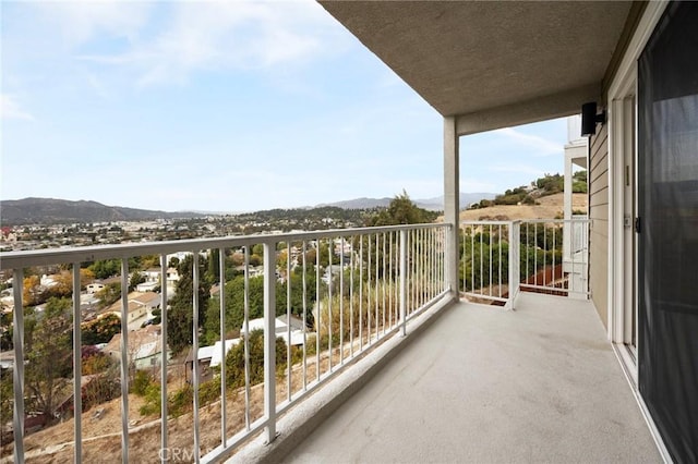 balcony featuring a mountain view