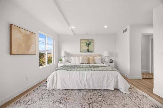 bedroom featuring hardwood / wood-style floors