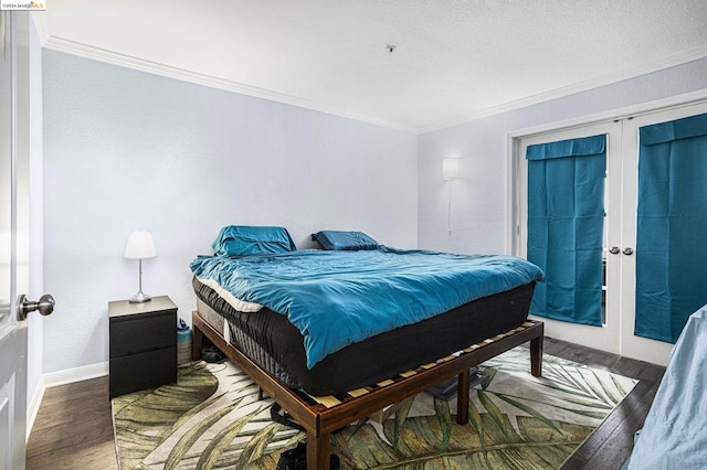 bedroom featuring wood-type flooring, french doors, and ornamental molding